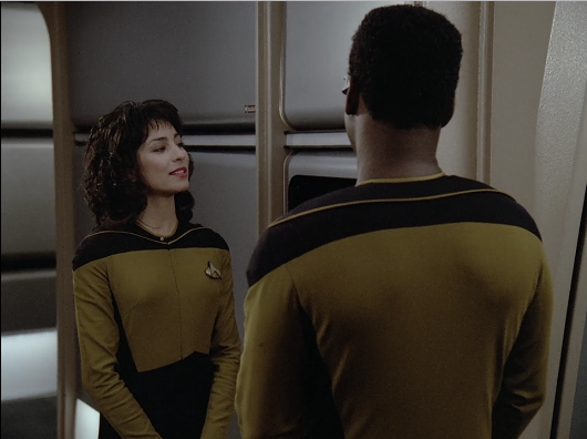 Ensign Gomez and Geordi on the bridge of the Enterprise